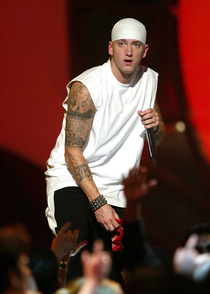 Rapper producer and actor Eminem has Dog tags tattooed around his neck 